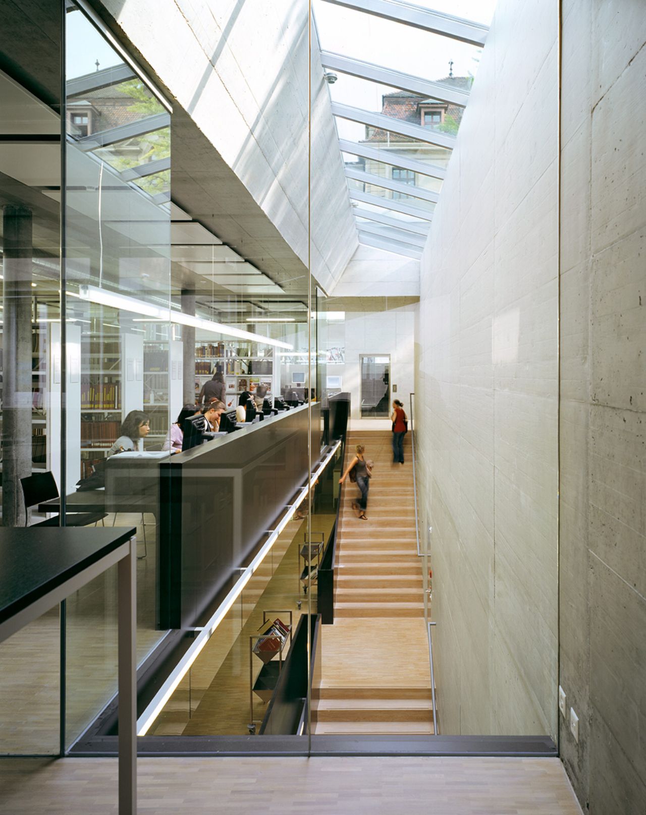 The cascade staircase in the Vera Oeri Library with a skylight frieze