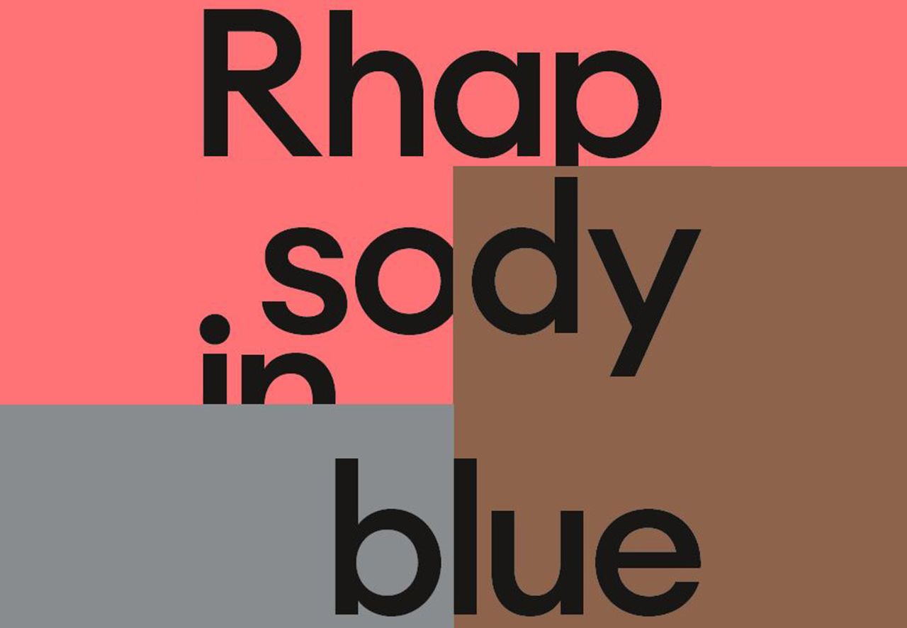 Schrift Rhapsody in Blue auf rot-grau-braunem Hintergrund